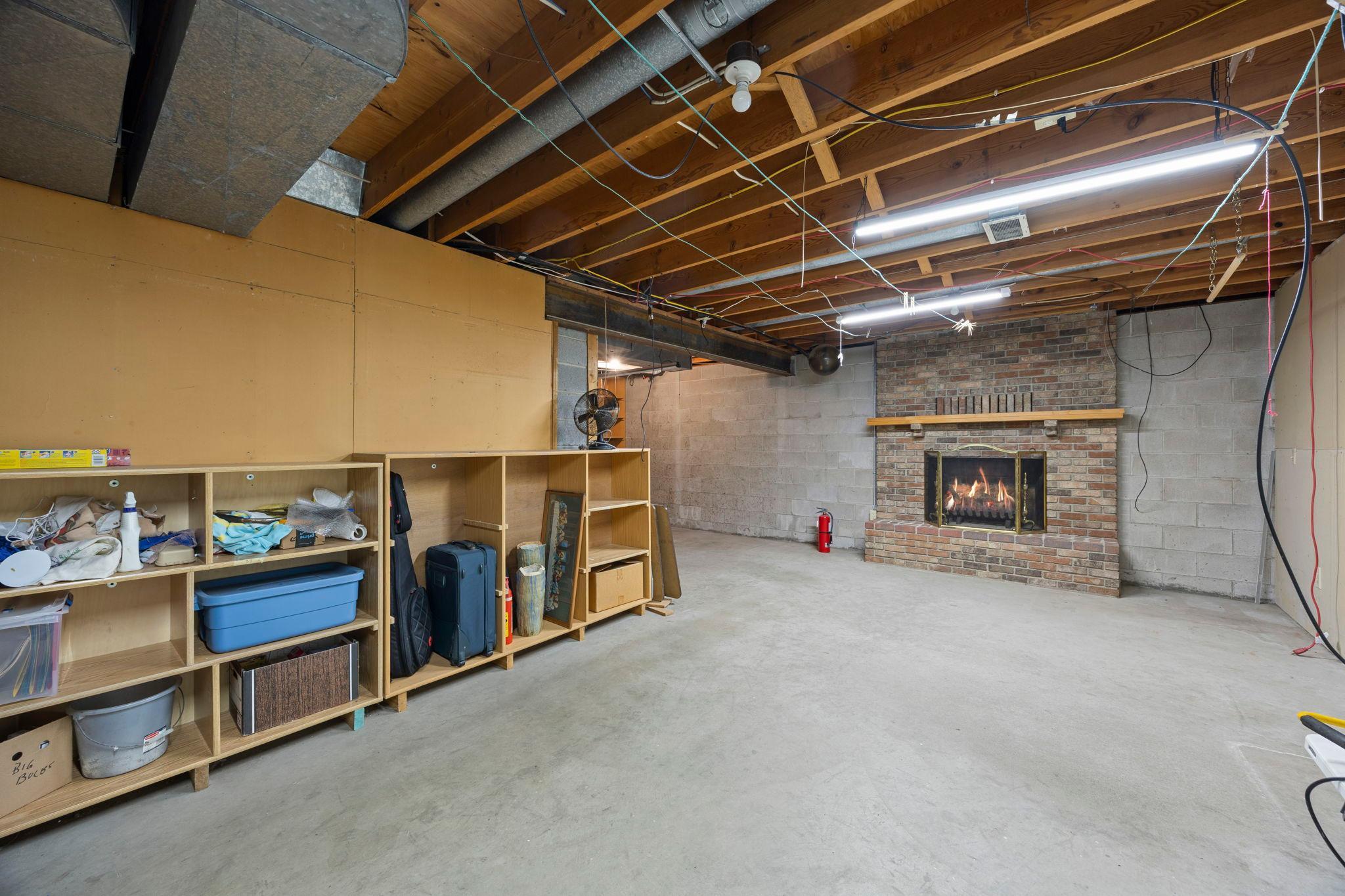 Lower level also has a wood fireplace and a walkout.