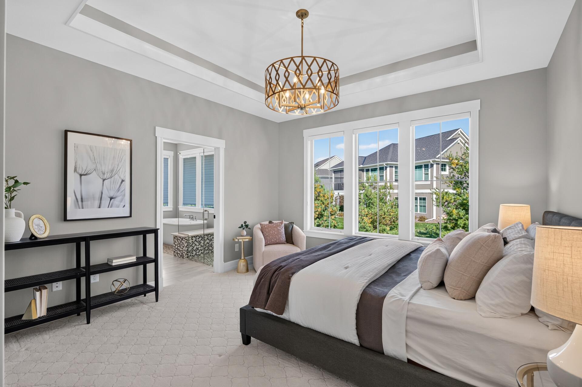 Main Level Owner's Suite includes its own private bathroom and walk-in closet