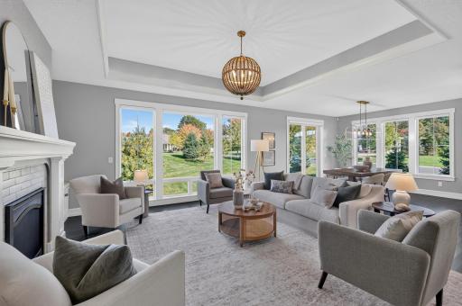 The Great Room features a box-vault ceiling and accent lighting