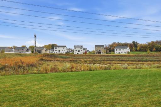 Enjoy peaceful rear views of open green space and natural surroundings, creating a serene backdrop to everyday living.