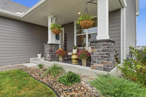 A charming covered porch that enhances curb appeal and provides a warm welcome home.
