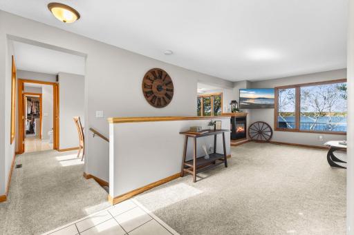 Large foyer with new carpet on main level