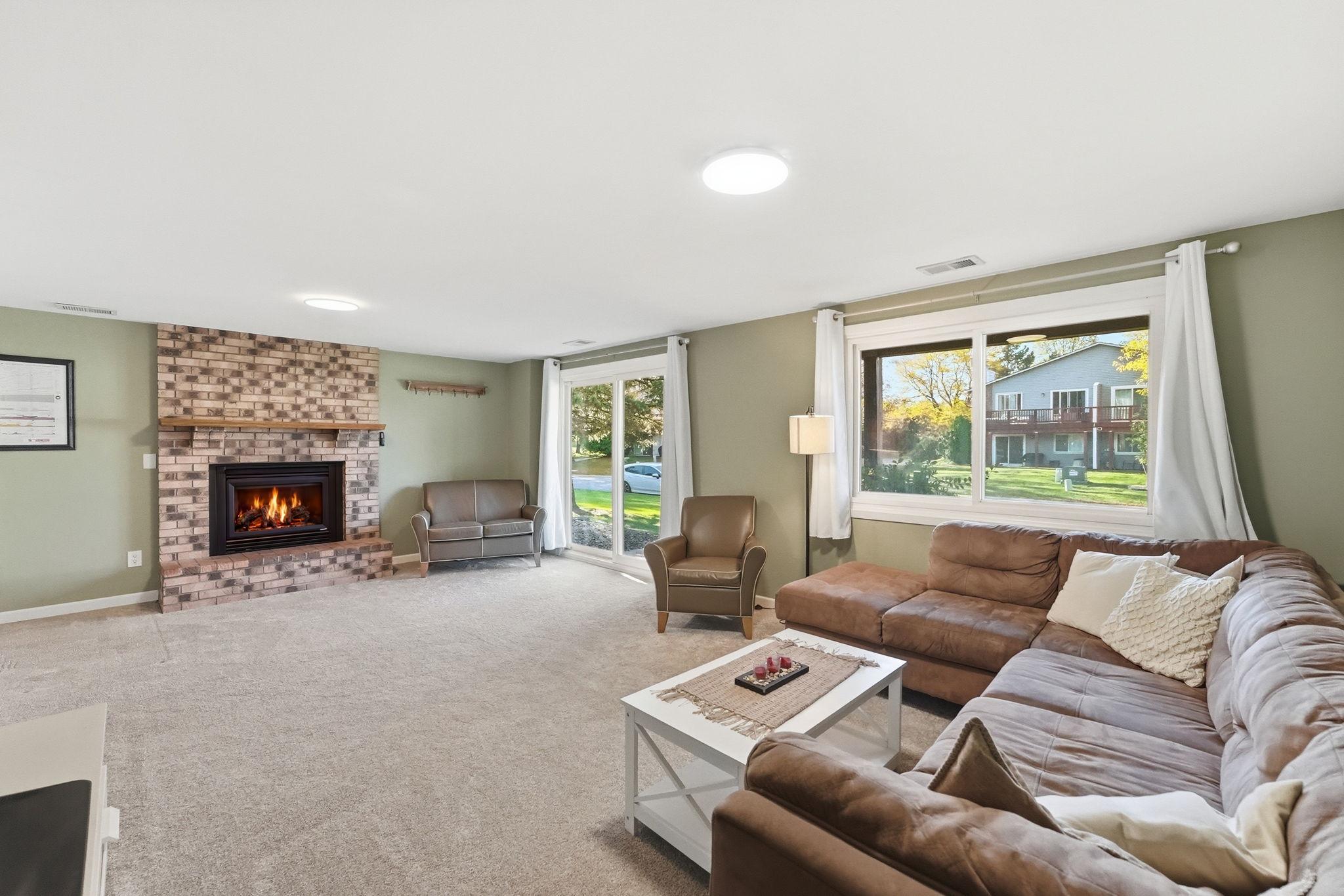 Cozy up by the brick fireplace