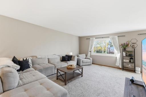 Neutral and modern paint tones and big windows - make this space your own