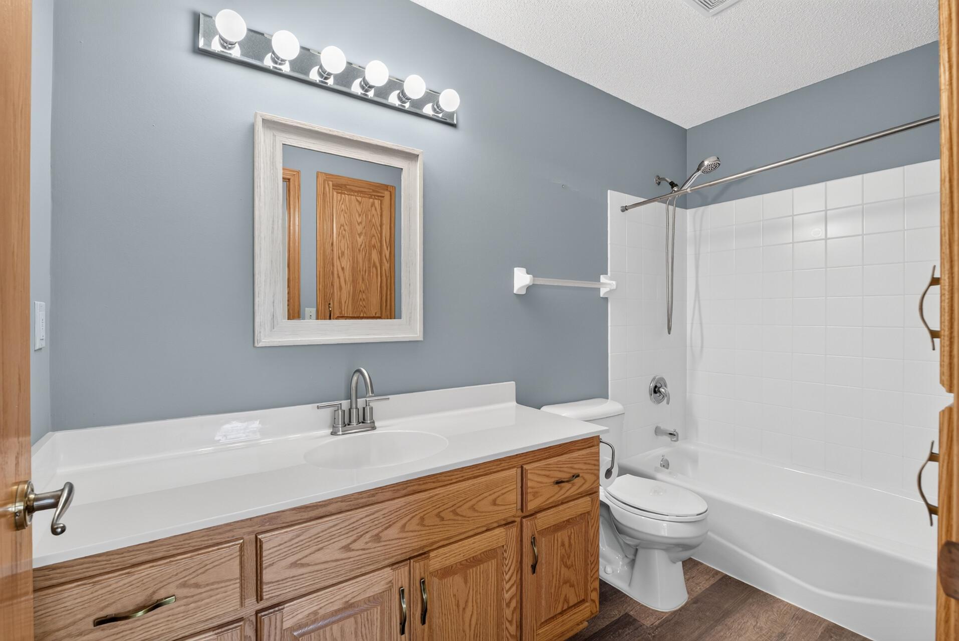 Another HUGE vanity w/full tub and shower.