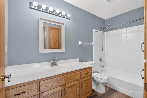 Another HUGE vanity w/full tub and shower.