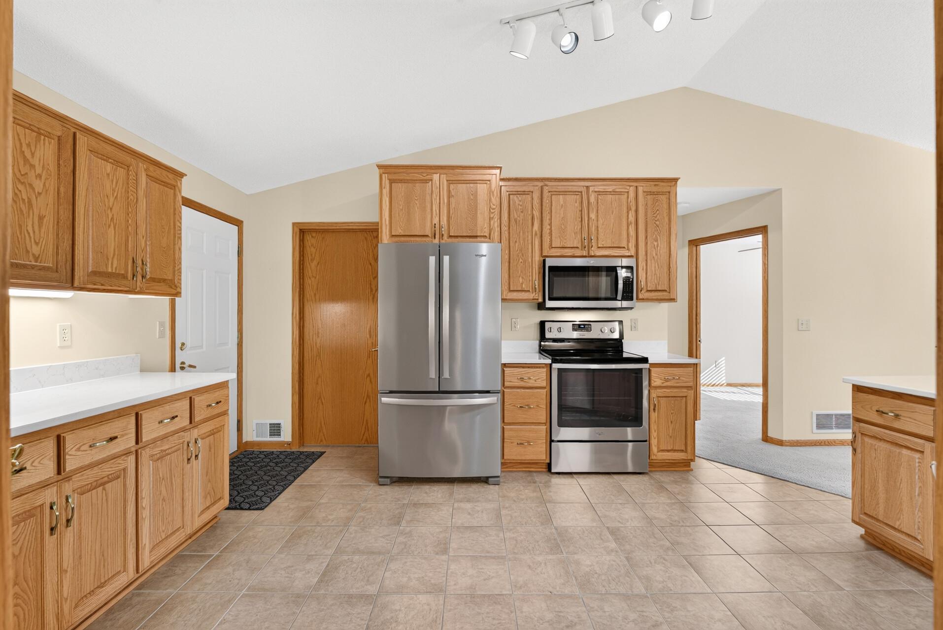 So much storage and work space! Door to the left goes to Garage. Other door is Laundry/Mechanical/Storage.