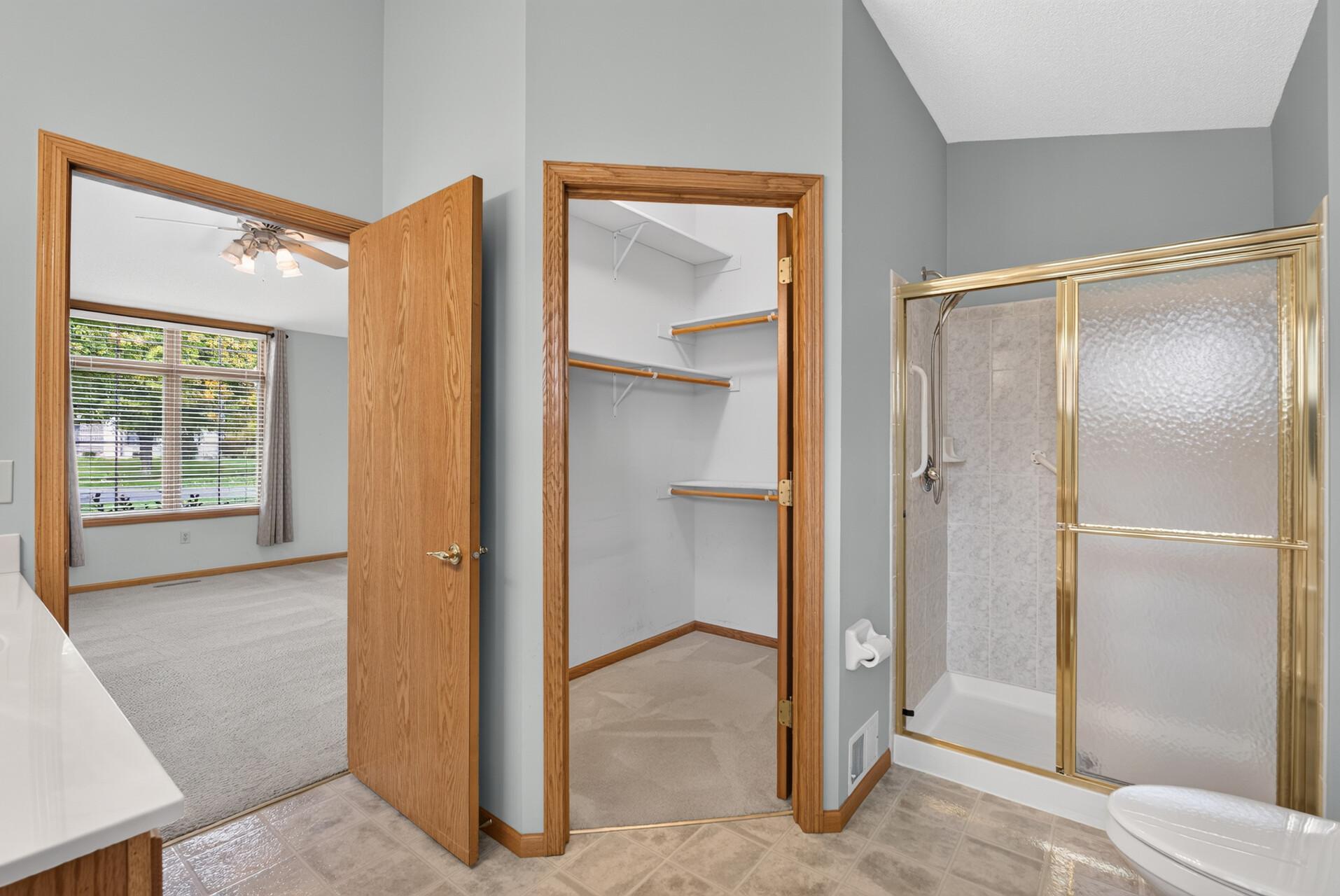 Walk in closet and separate shower.
