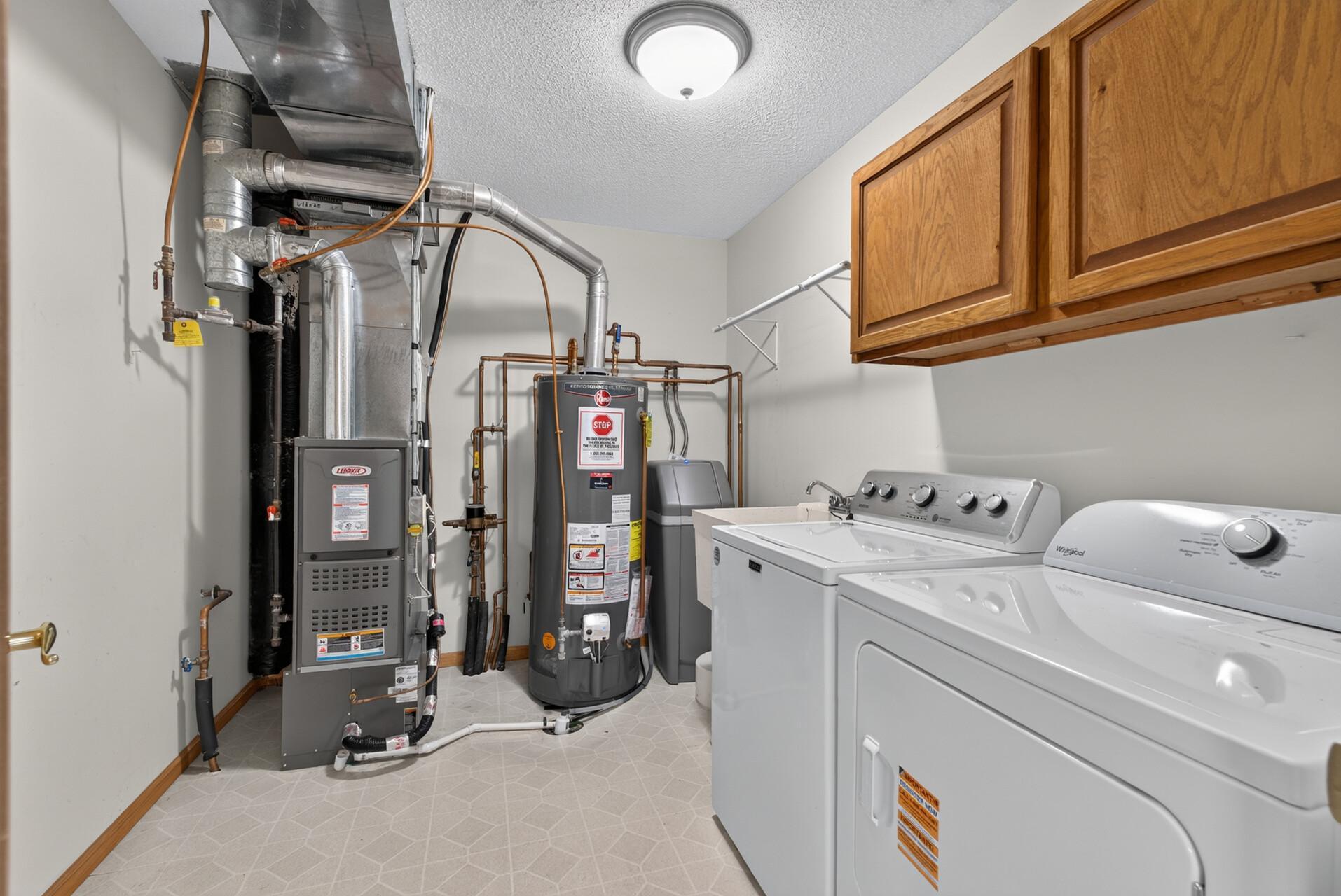 Well planned Laundry/Mechanical Room with lots of room for extra storge options.