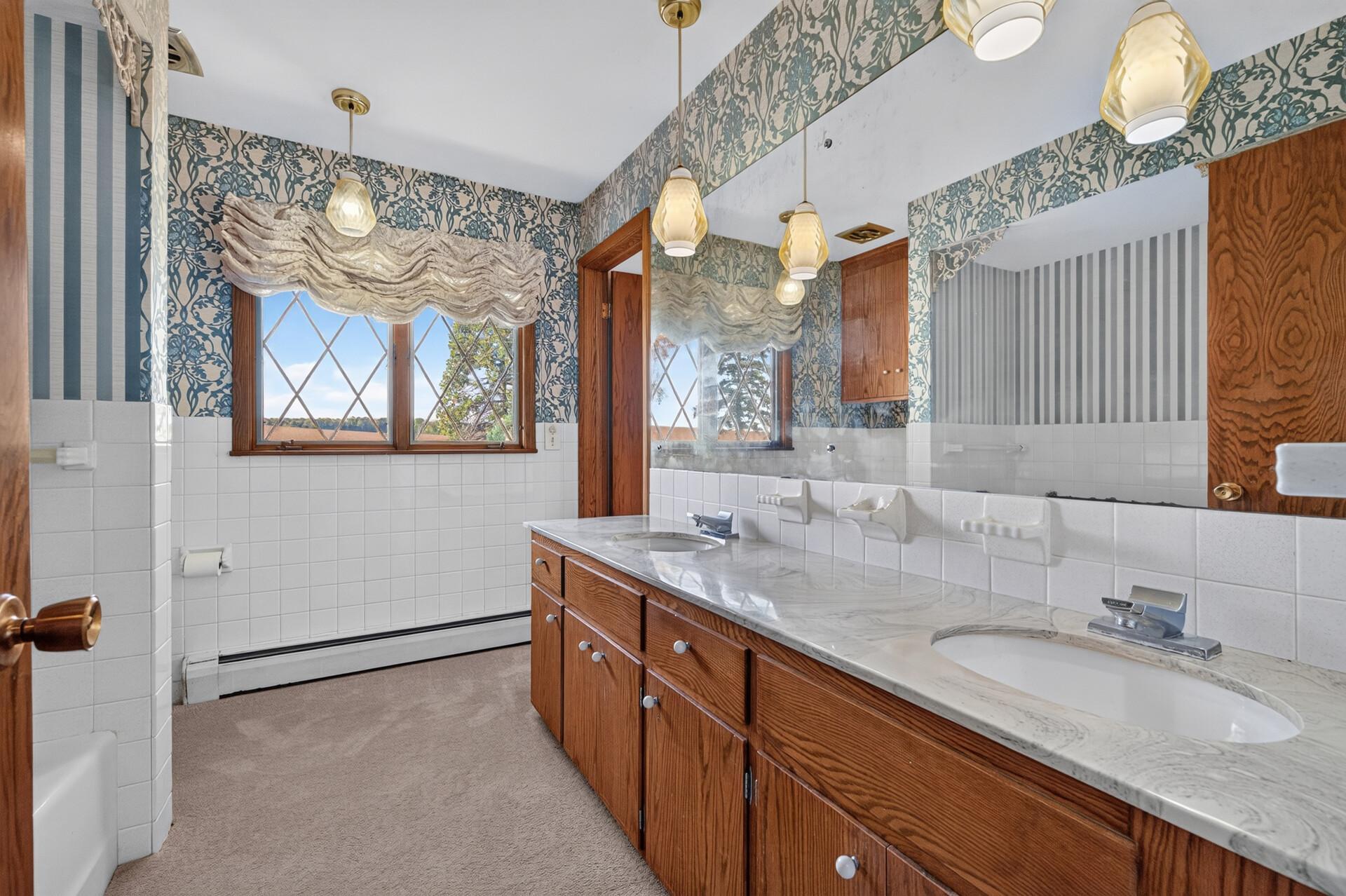 Main Level 3/4 Bath with door to bedroom