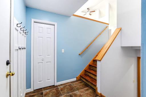 Welcoming entryway with tile flooring and a front closet, perfect for everyday organization and easy coming-and-going.
