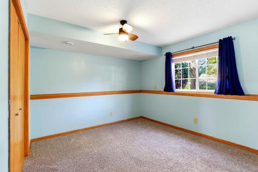 Fourth Bedroom on the lower level offering comfort, flexibility, and great separation from main-level living.
