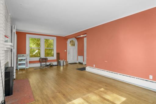 Notice the historic details like the arched doorway