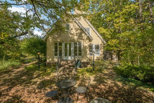 Cozy and private patio off of the sunroom