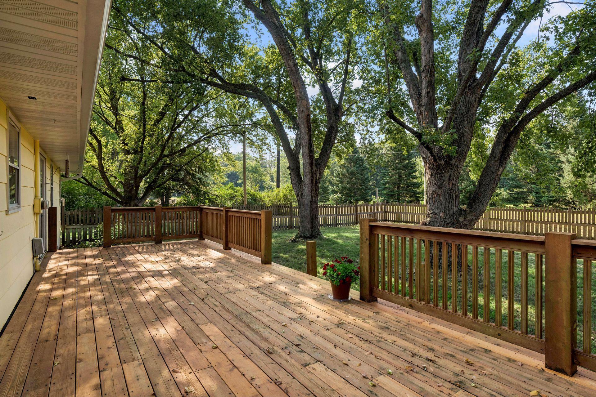 Over-sized deck overlooking the .75 acre lot