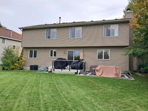 Back of Home with Spacious Level Backyard