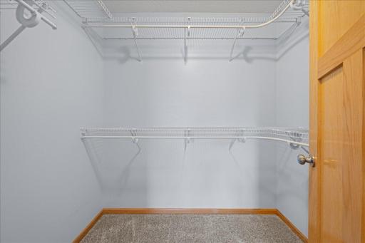 Large walk-in closet in the primary suite on the upper level.
