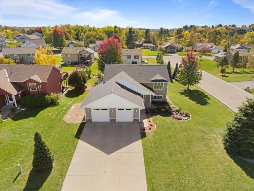 Gorgeous landscaping on this large corner lot. The trees are just starting to turn!