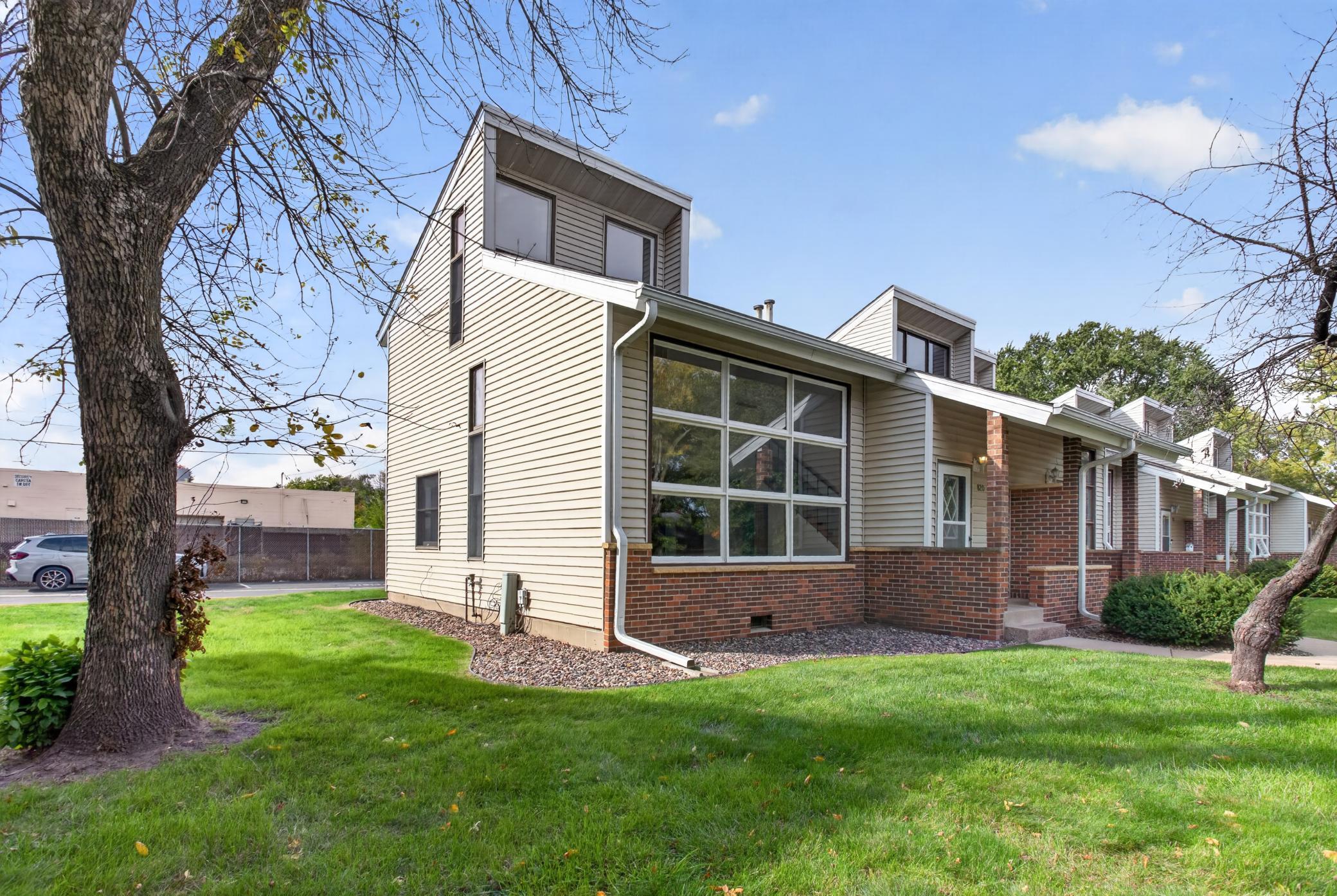 End unit with TONS of natural light and windows with vaulted ceilings