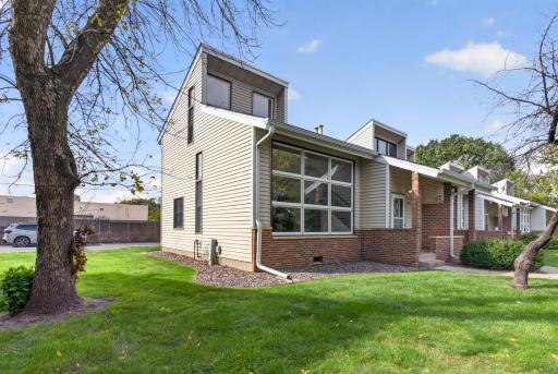 End unit with TONS of natural light and windows with vaulted ceilings