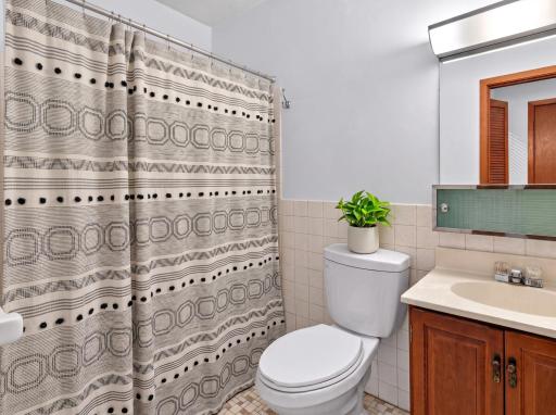 Upper level: full bathroom (virtually staged)
