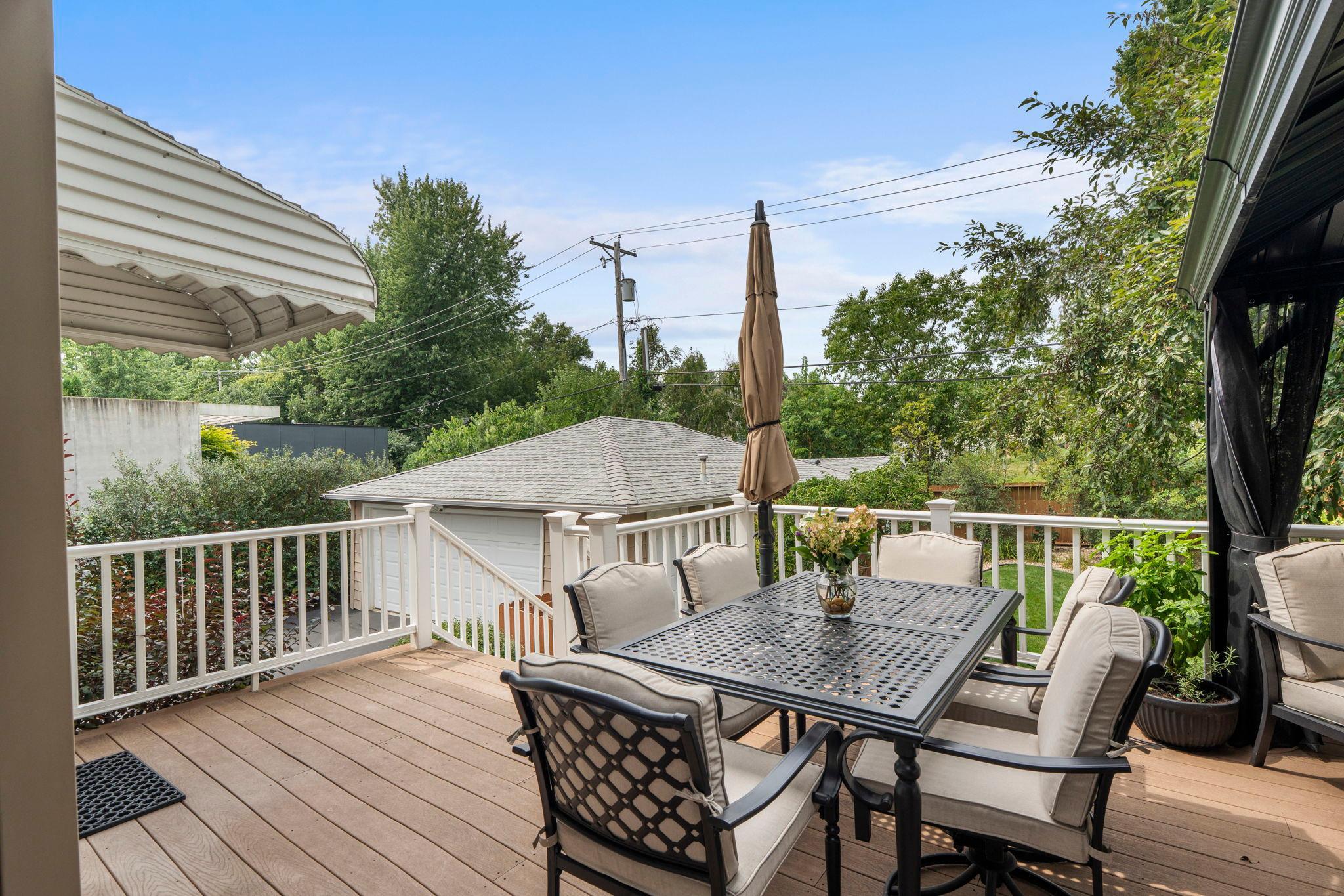 The full-length deck, complete with a retractable awning, offers plenty of room for outdoor entertaining.