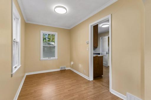 Plenty of space for a dining room table and some additional furniture.