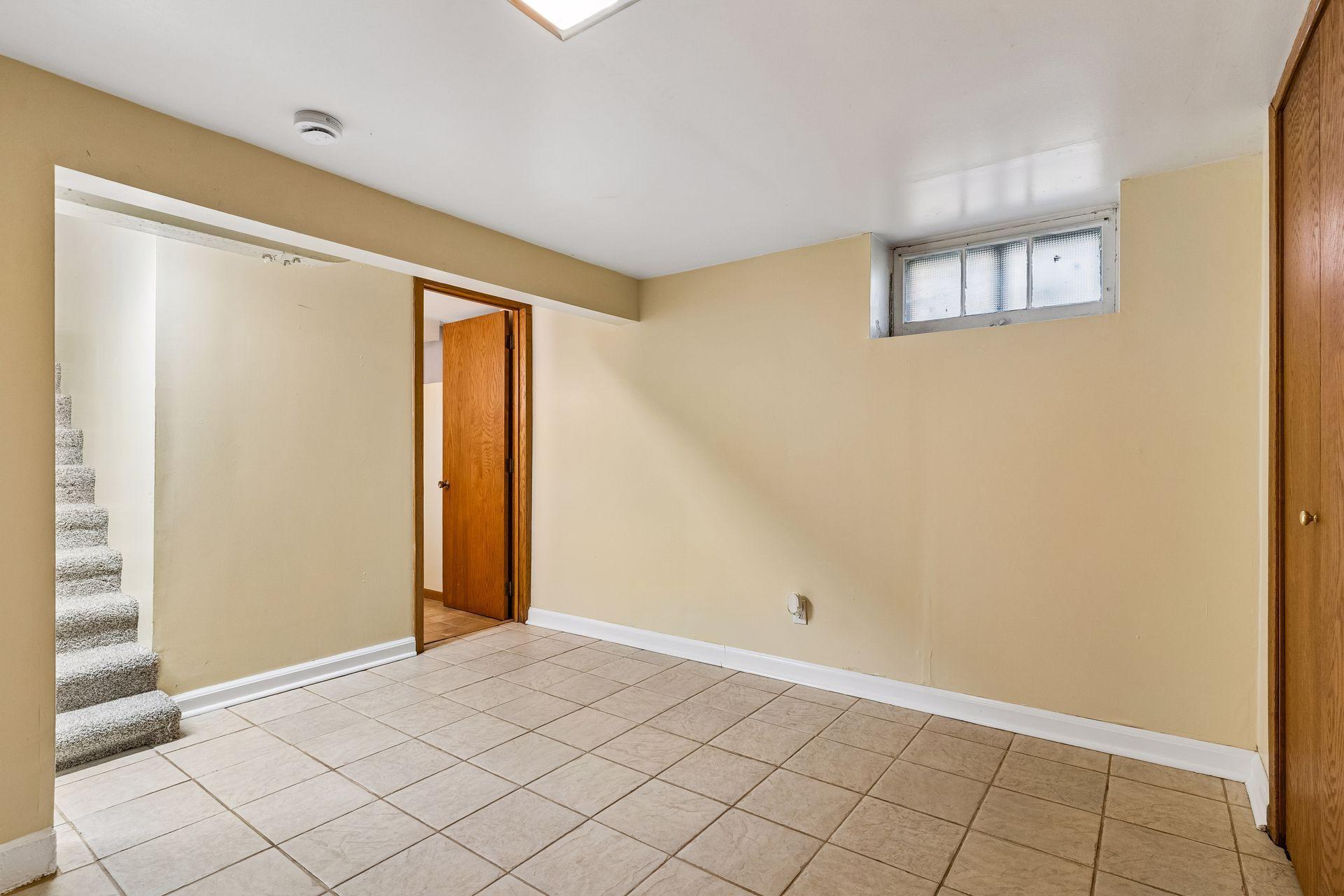 There is a convenient 3/4 bath in the basement through this door...