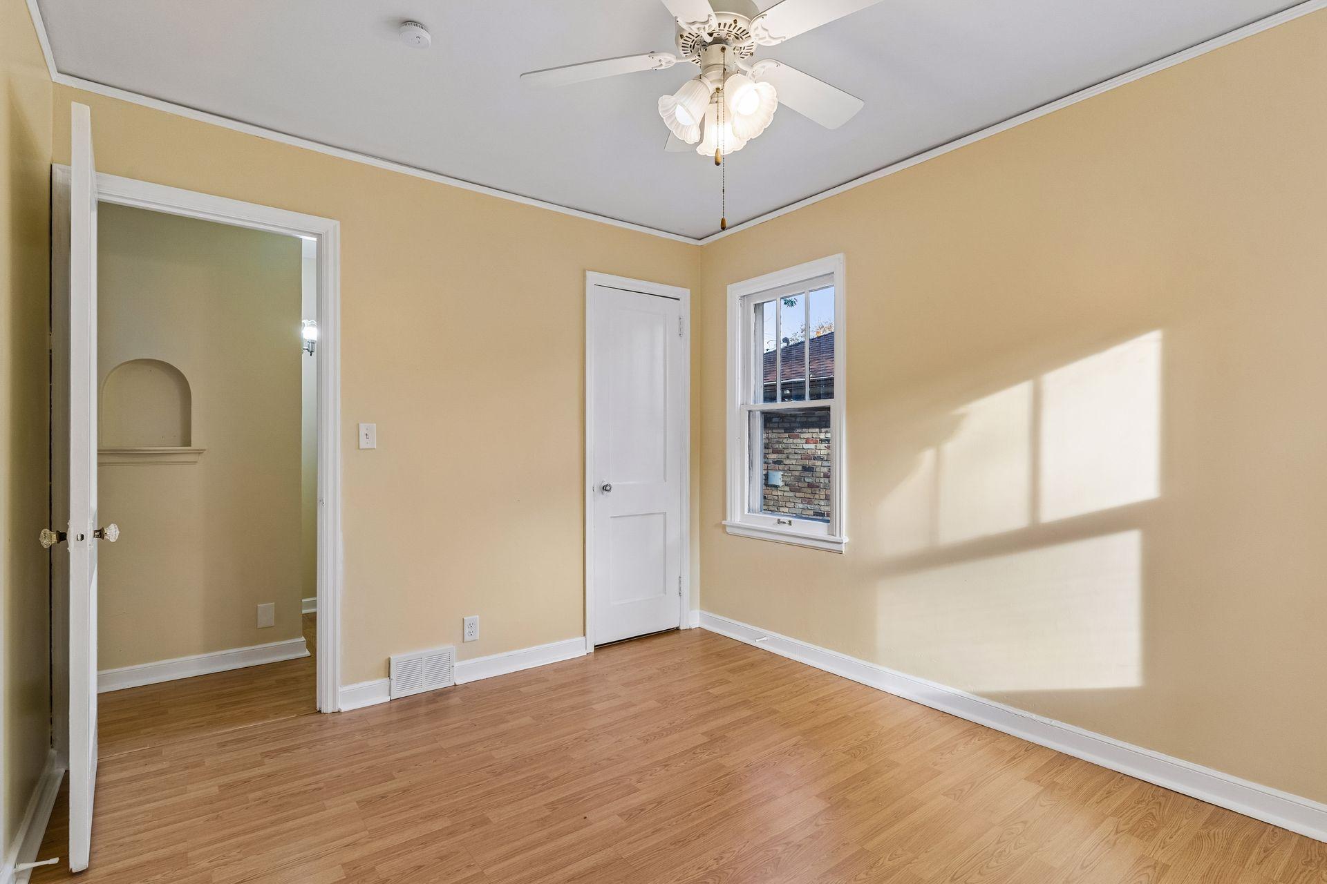 Loads of light and plenty of closet space in the main floor bedroom.