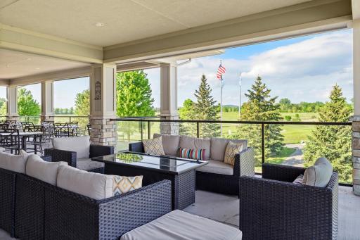 Indoor seating, a covered terrace, and patio dining offer panoramic views of the golf course and the Mississippi River Bluffs. (Photo courtesy of The Jewel Golf Club)