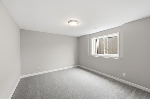 Finished Walkout Basement Bedroom 5 - The Madison at 937 Kepler Ave NE in Oakview Ridge!