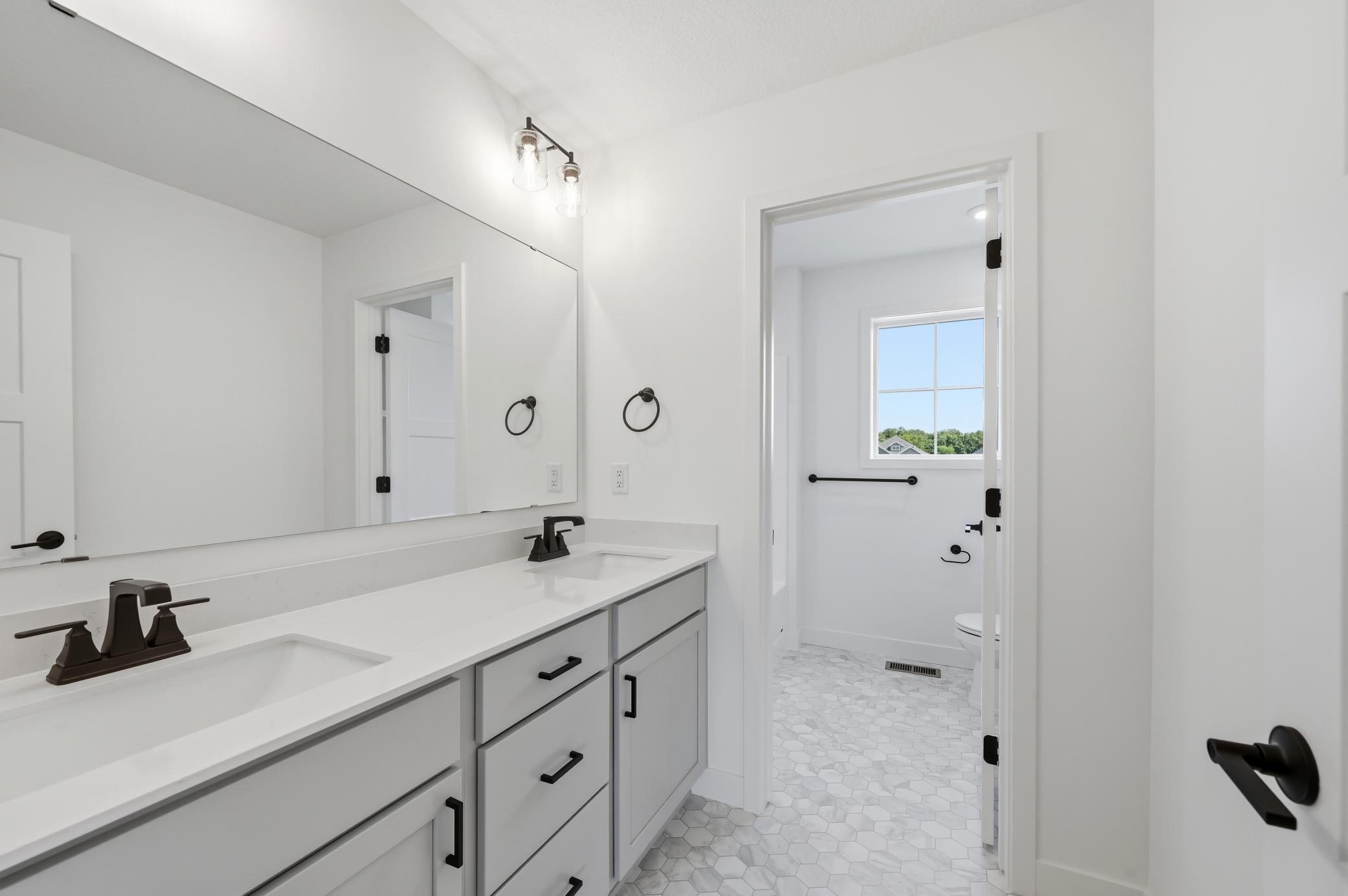 Upper Level Hall Bath - The Brookview at 819 Walnut Grove Lane in Oakview Ridge!