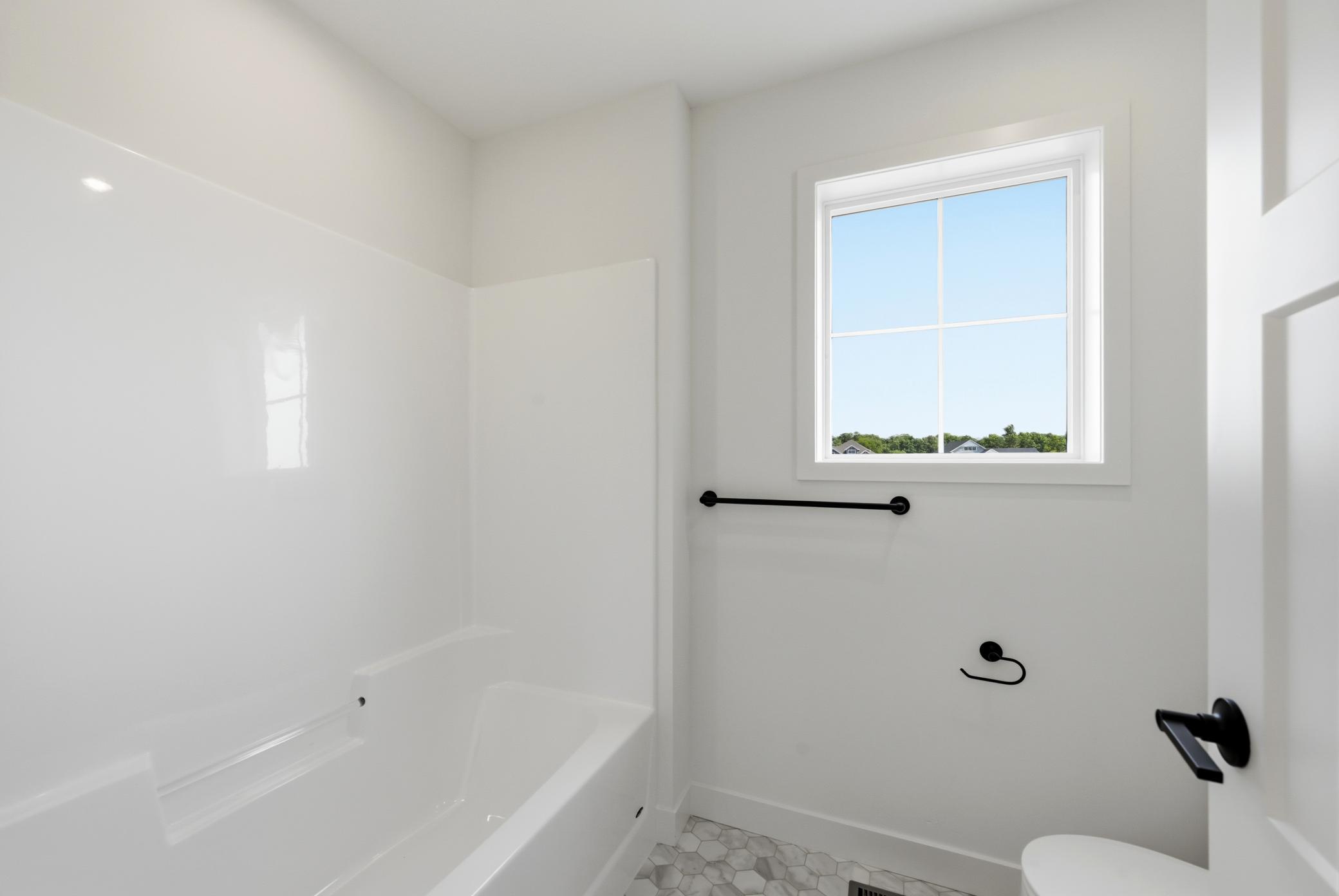 Upper Level Hall Bath - The Brookview at 819 Walnut Grove Lane in Oakview Ridge!