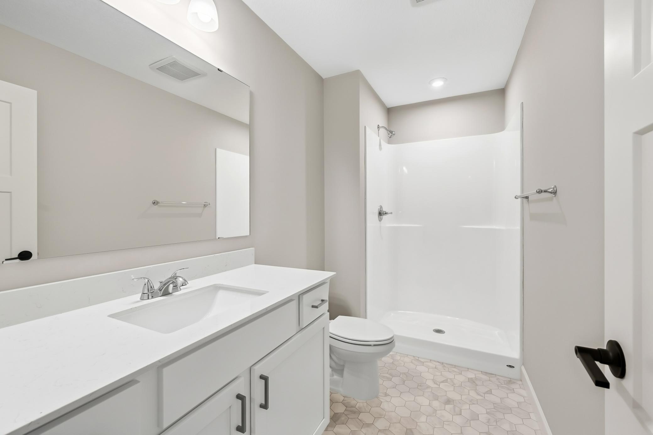 Finished Lower Level 3/4 Bath - The Crestview at 810 Walnut Ct in Oakview Ridge!