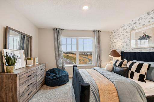 Upper level has 4 large bedrooms. Model photos. Options and colors will vary.