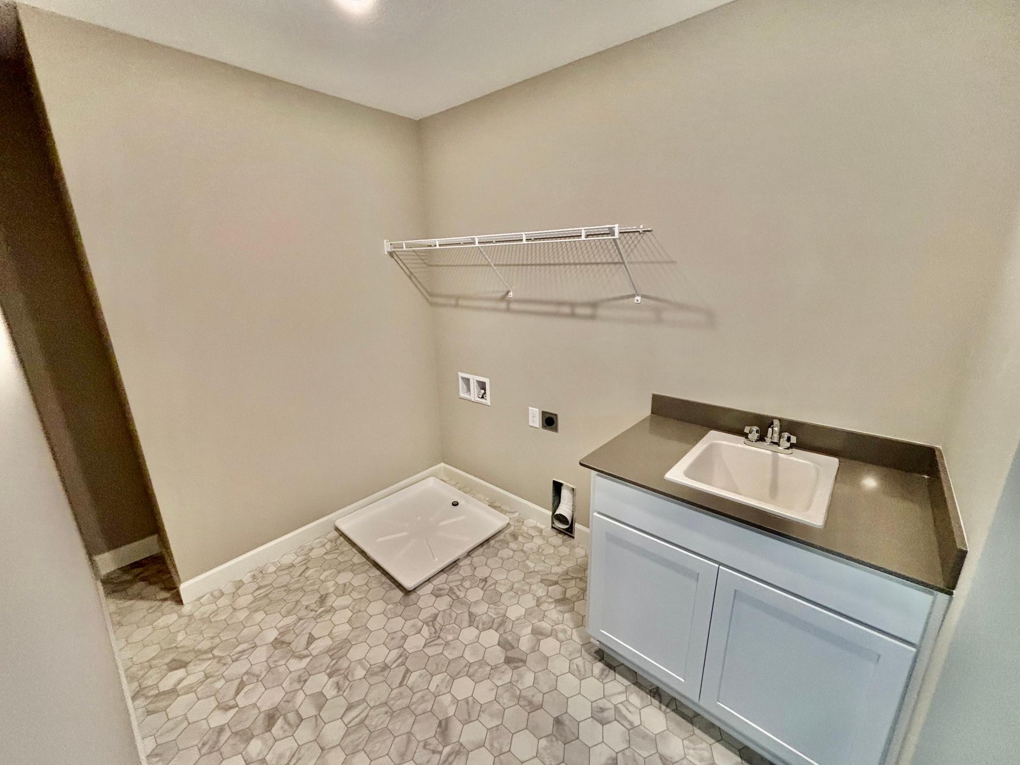Upper Level Laundry - The Summit at 941 Kepler Ave NE in Oakview Ridge!