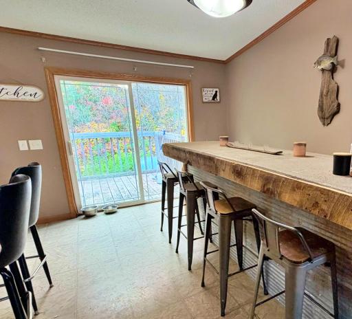 Dining area with sliding door to oversixed deck.jpg