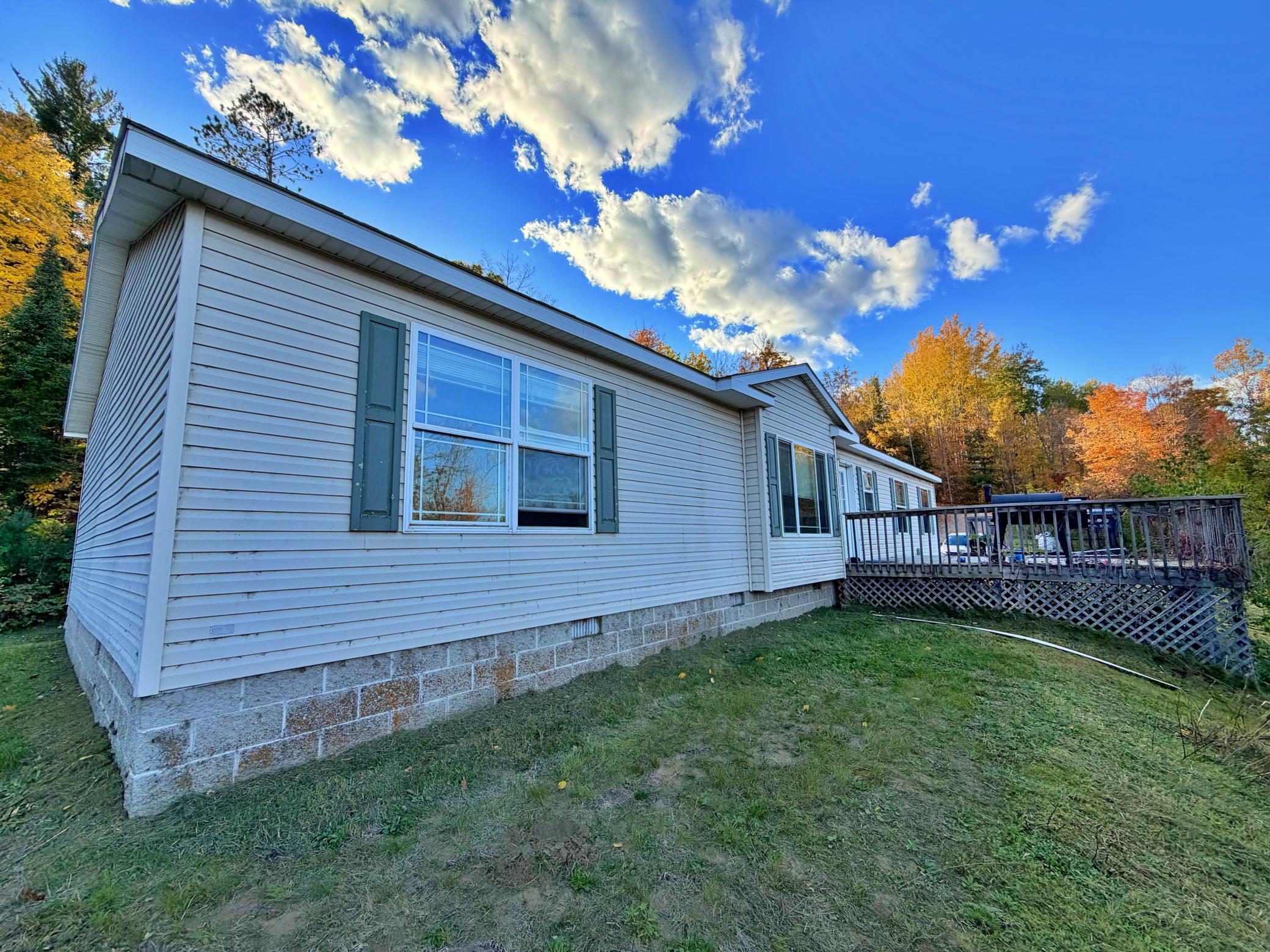 Front view of home with oversized deck.jpg