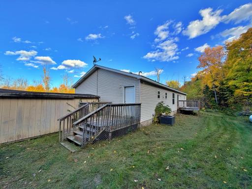 Back yard view of home with deck and shed.jpg