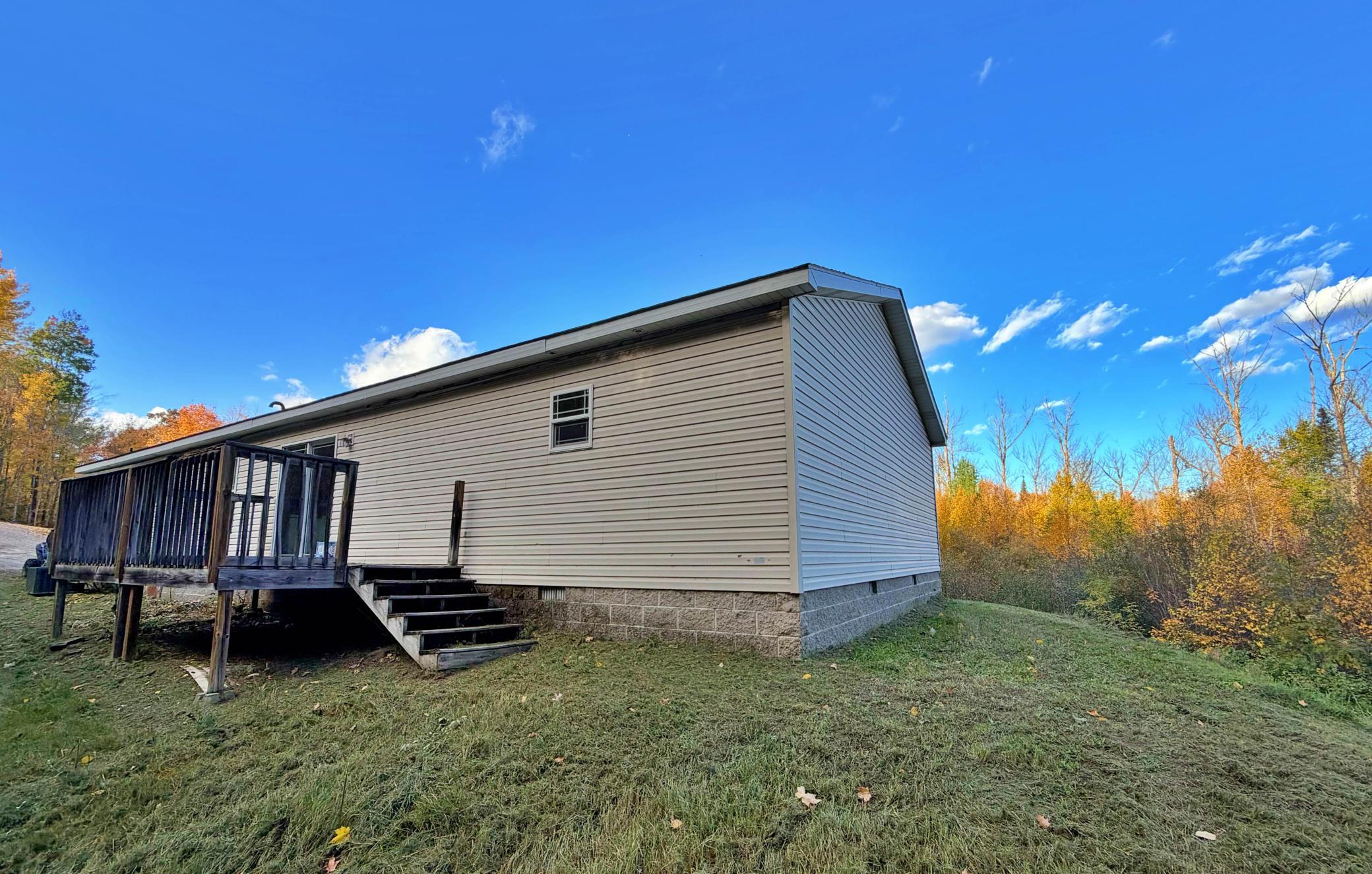 Back view of home with deck.jpg