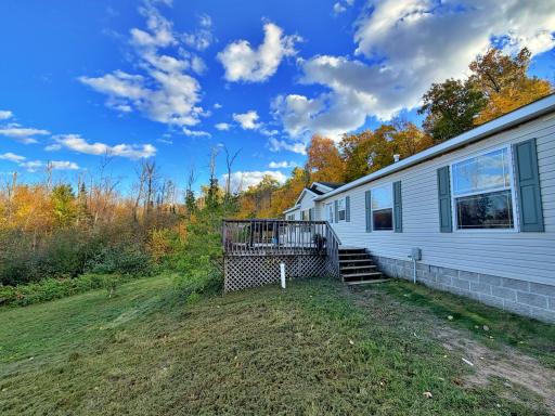 View of home and front deck with yard view.jpg