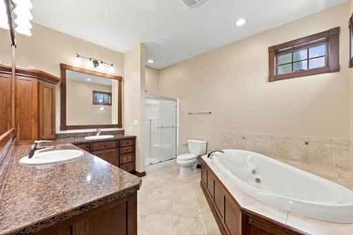 Primary Bathroom with deep jetted tub and separate shower