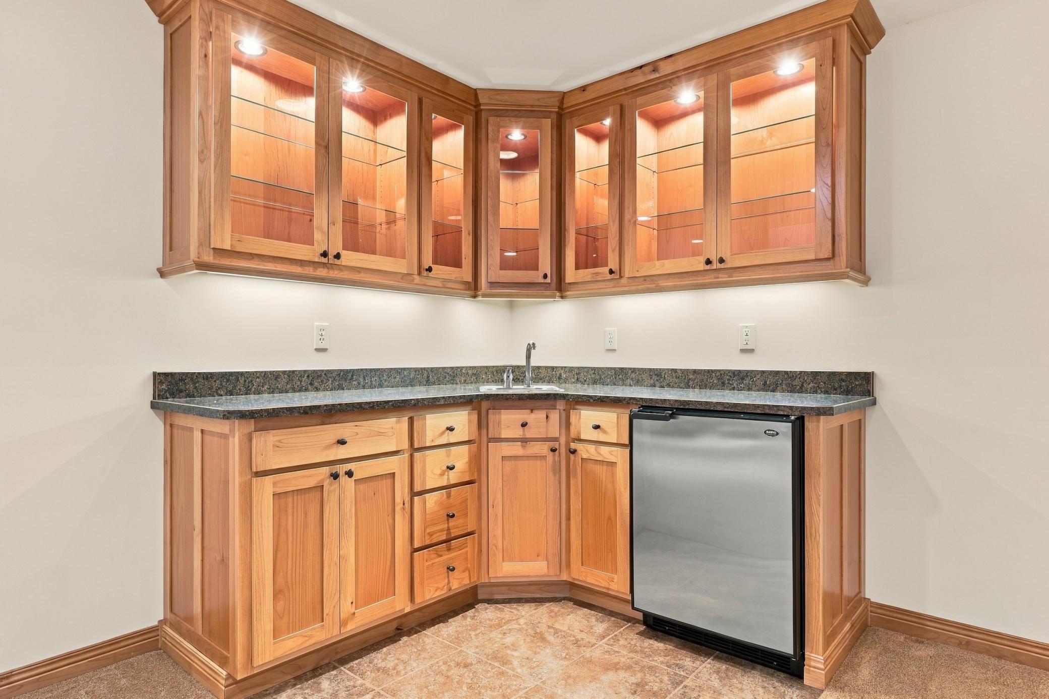 Wet Bar with water, dishwasher and space for a refrigerator