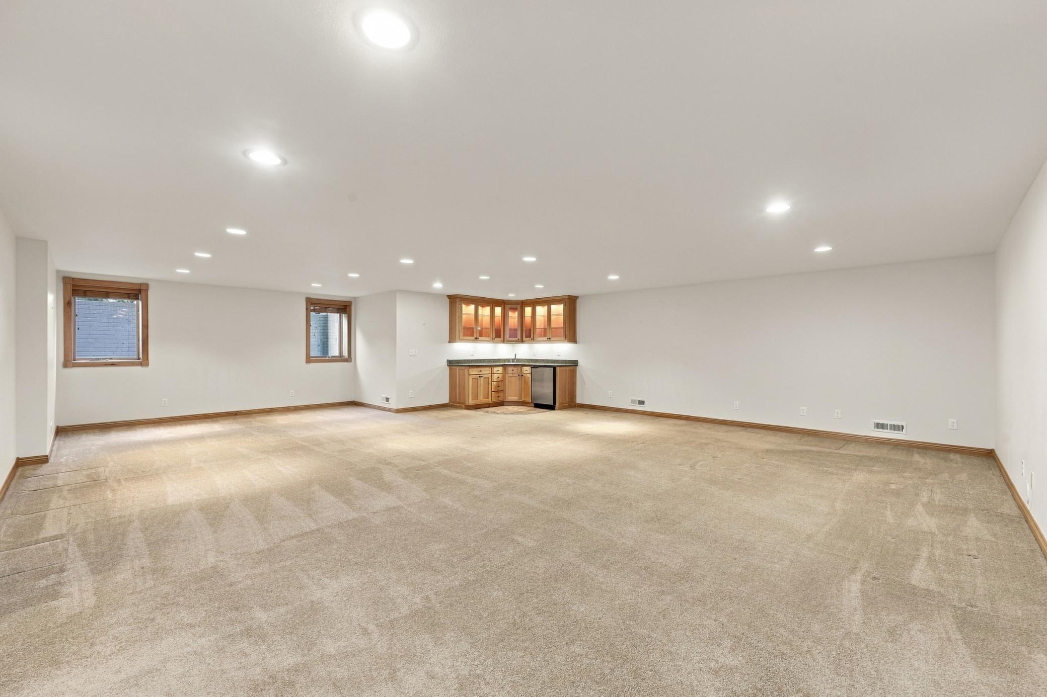 Enormous family room with a full wet bar