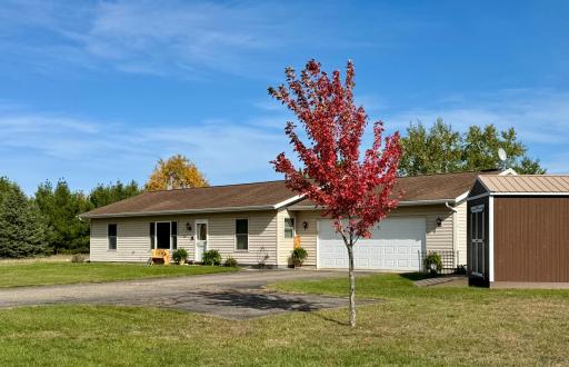 Single-level living, 2.5 acres, 2 bed, 2 bath, 2 sheds, 2-car heated garage with workbench and storage
