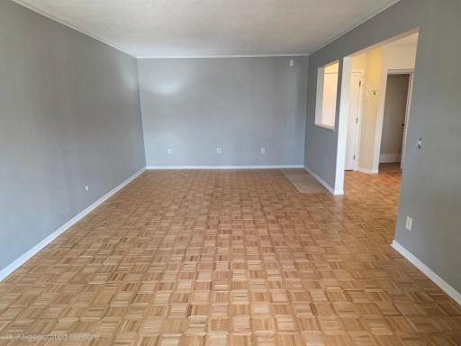 Living room and Formal Dining with original parkay flooring redone.