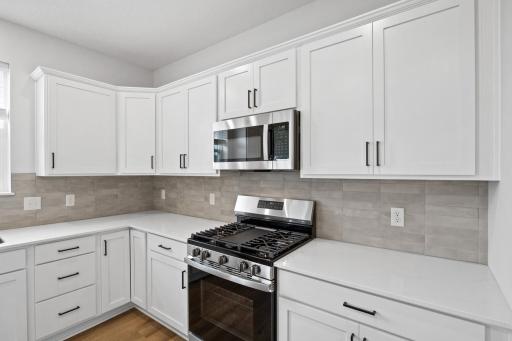 Stainless GE appliances are included with the home. (Photo of a similar home - Colors and selections will vary)