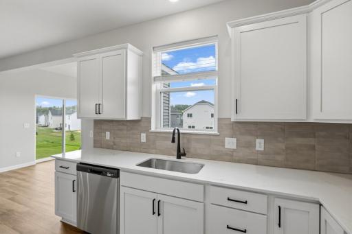 Kitchen window with view of your backyard. (Photo of similar home - Colors and selections will vary)