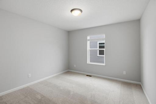 Fourth bedroom (Photo of a similar home - Colors and selections will vary)