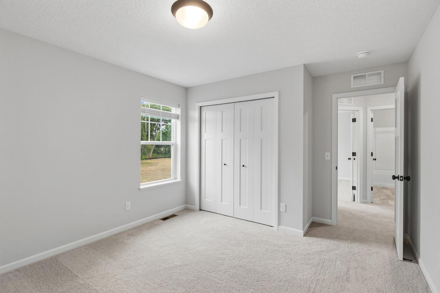 Third bedroom (Photo of a similar home - Colors and selections will vary)